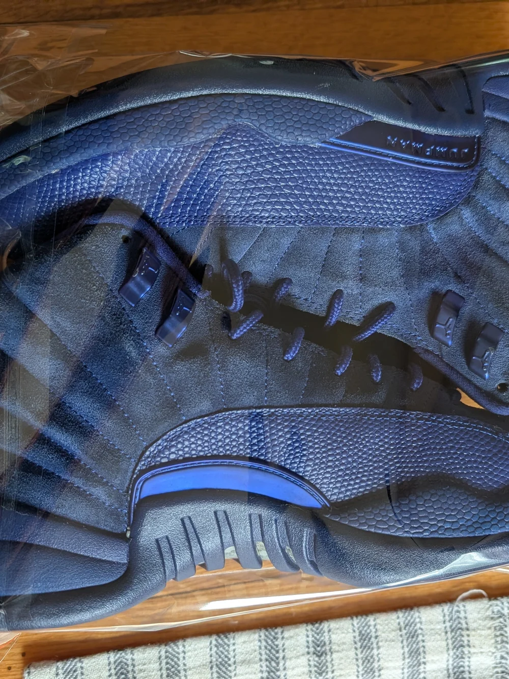 130690-400 belongs to the Air Jordan 12 Retro Premium 